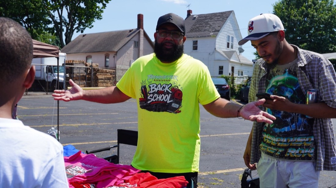 Trendsetter Barbershop representative at the Clark Avenue event