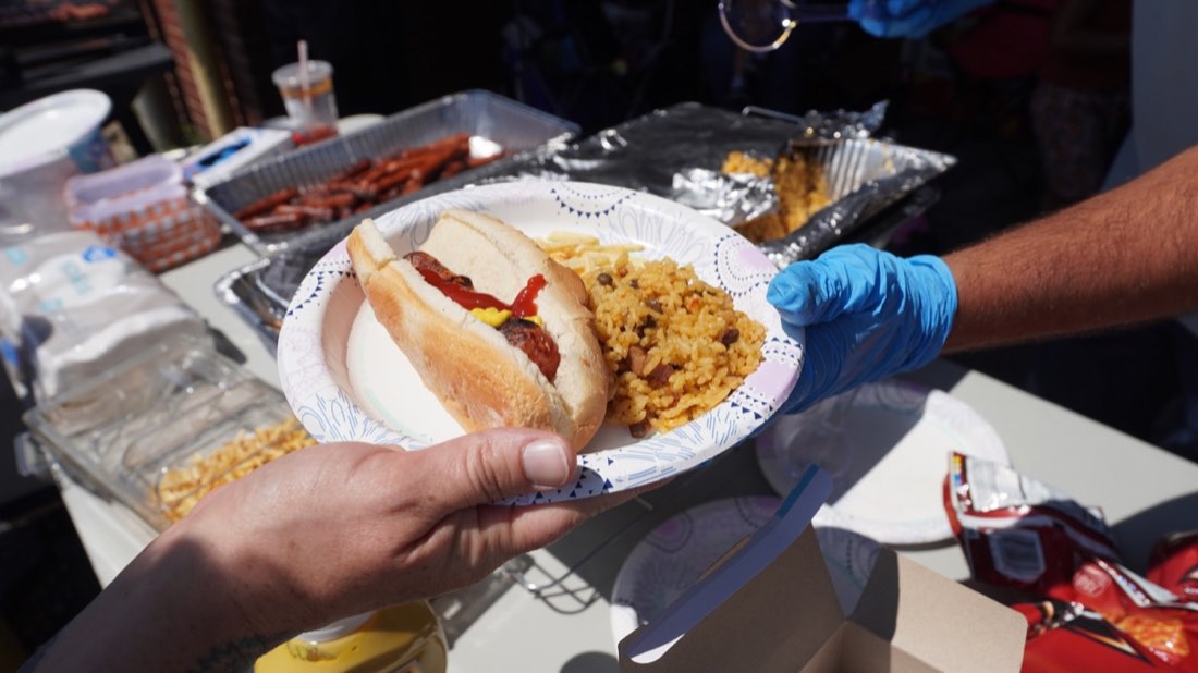 Free hot dog and rice meal served at the community event