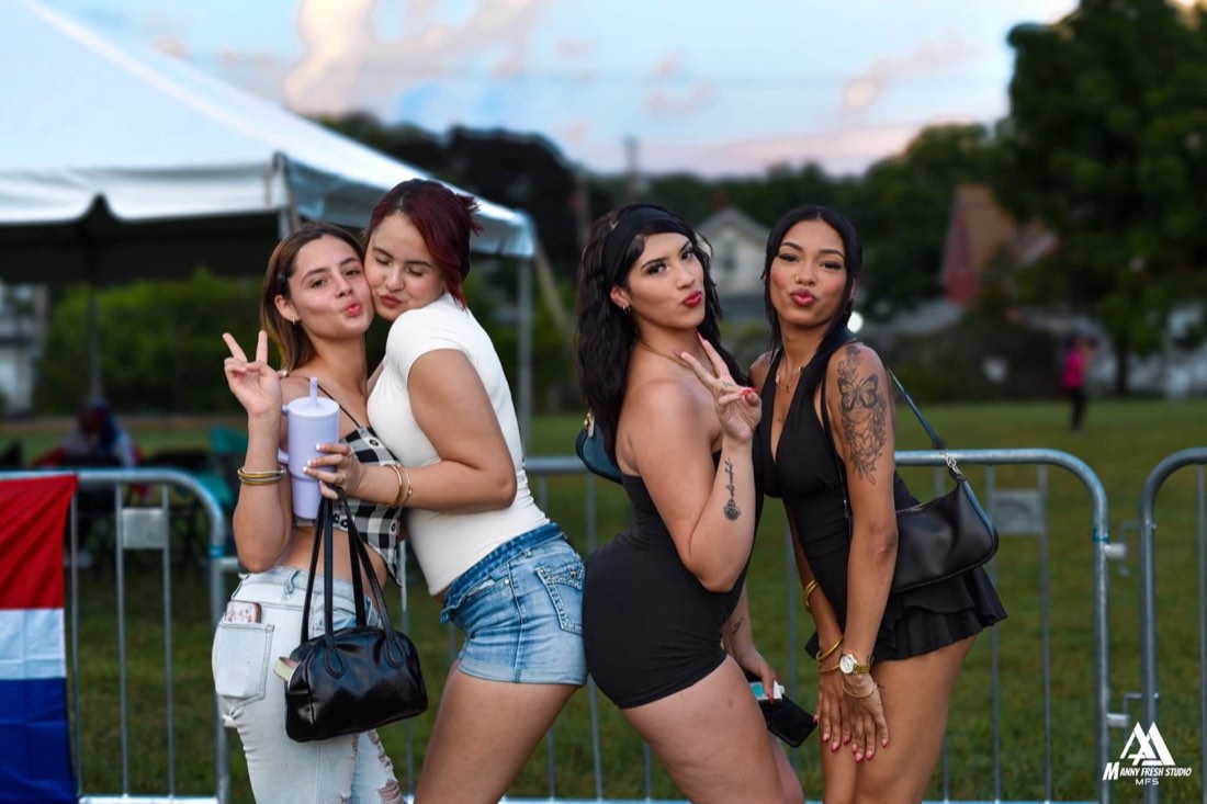 Four festival attendees posing