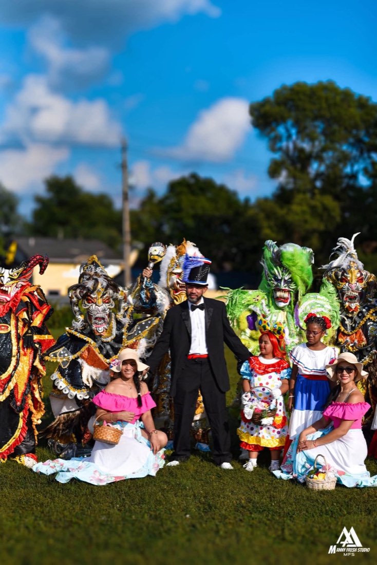 Traditional performers and festival participants posing together