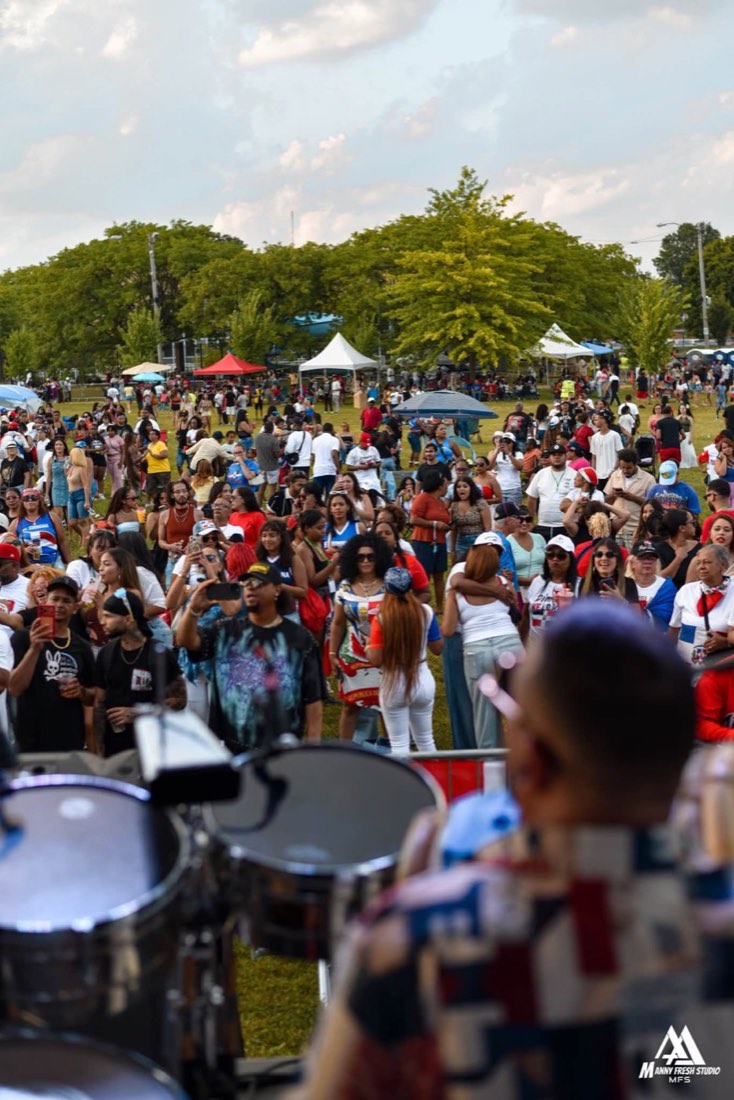 Large festival crowd viewed from the stage