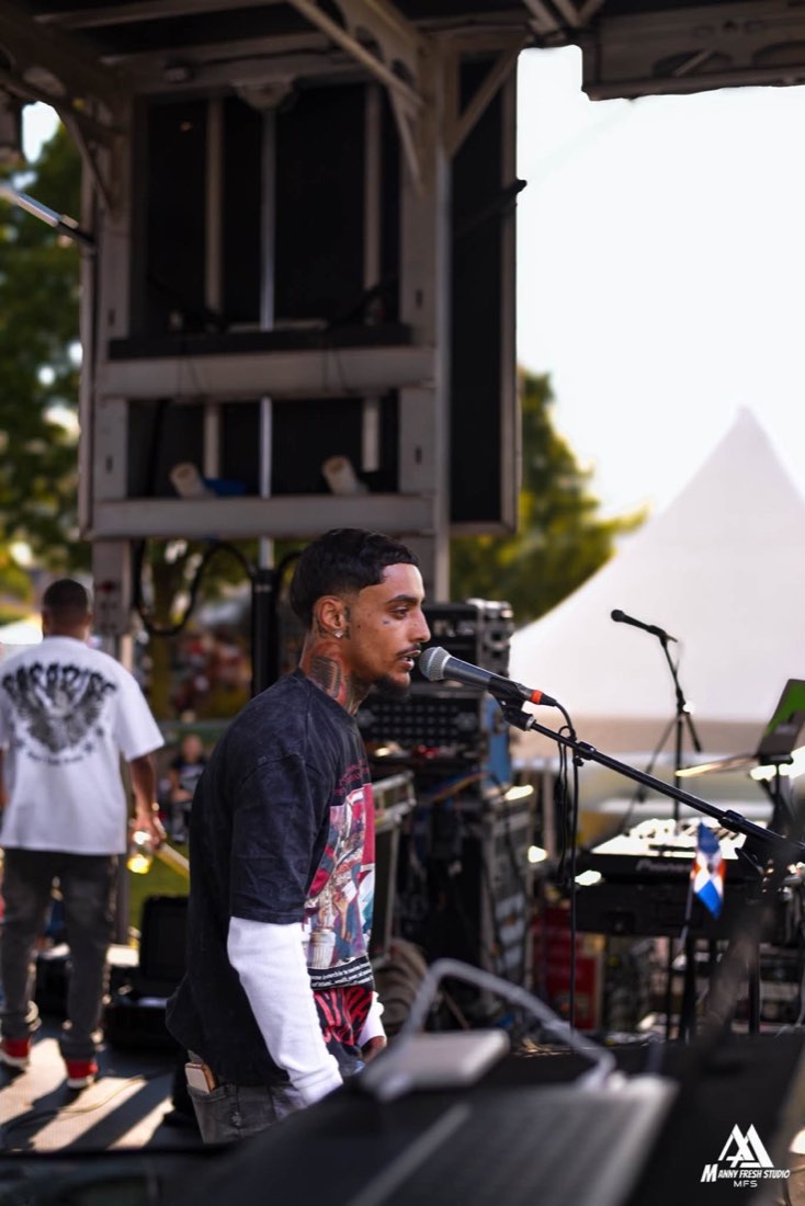 Singer performing on the festival stage