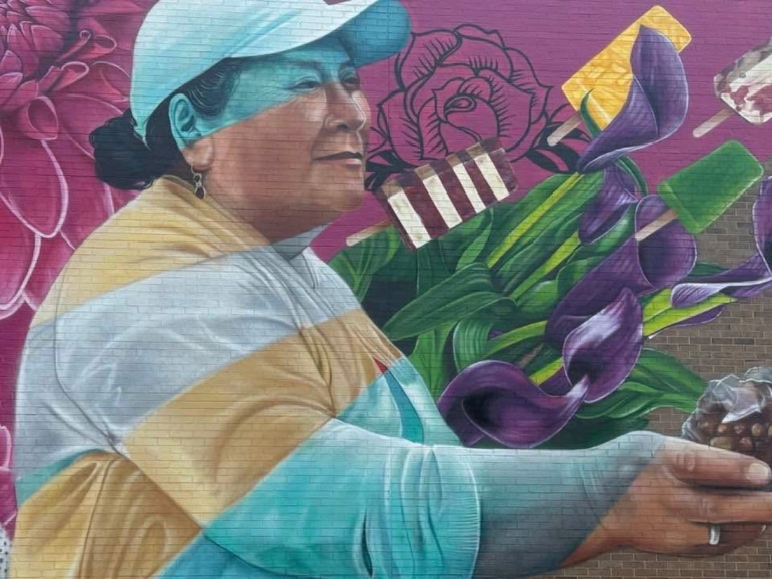 Detail of a market vendor in the MARKA27 Eastman Branch mural