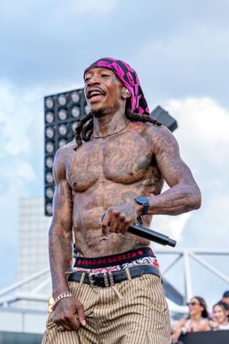Wiz Khalifa smiling on the MGK Day stage
