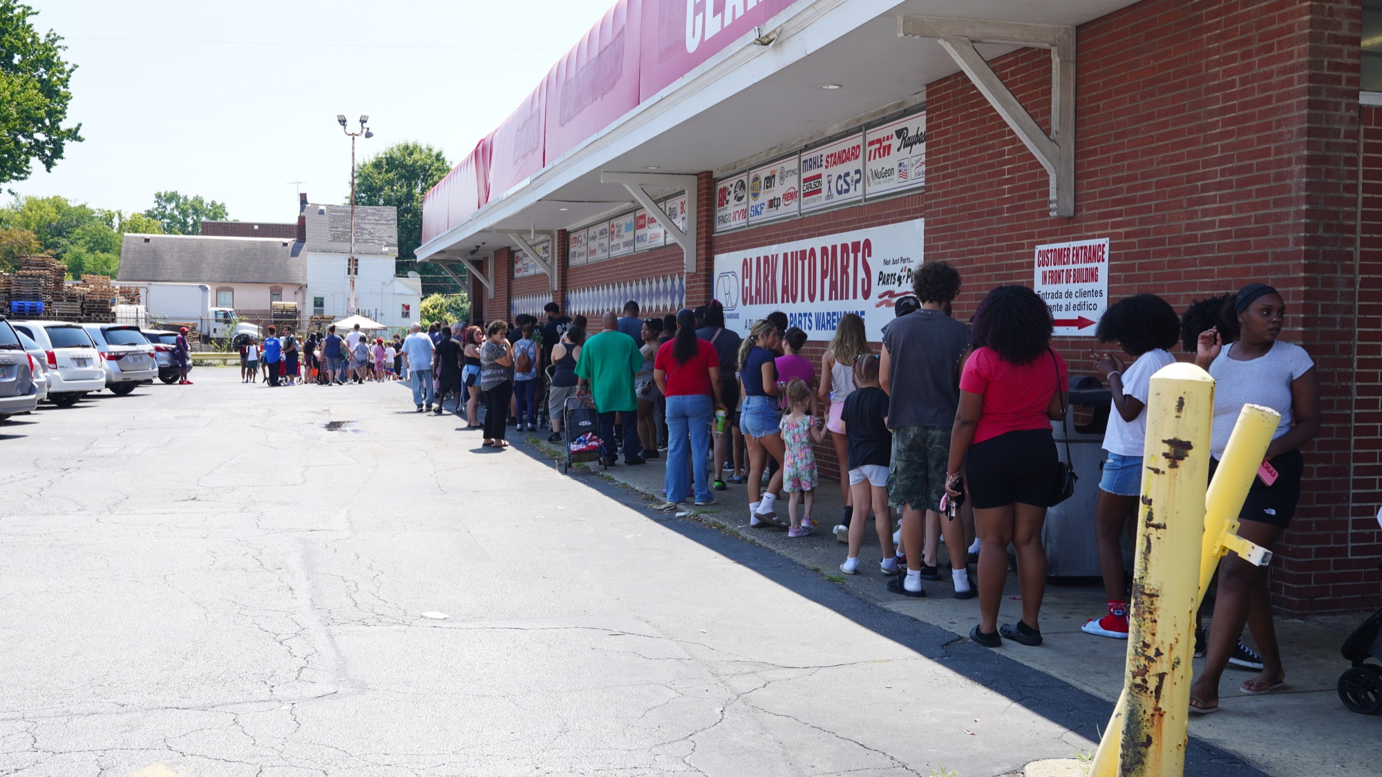 Families lined up outside Clark Auto Parts in Cleveland