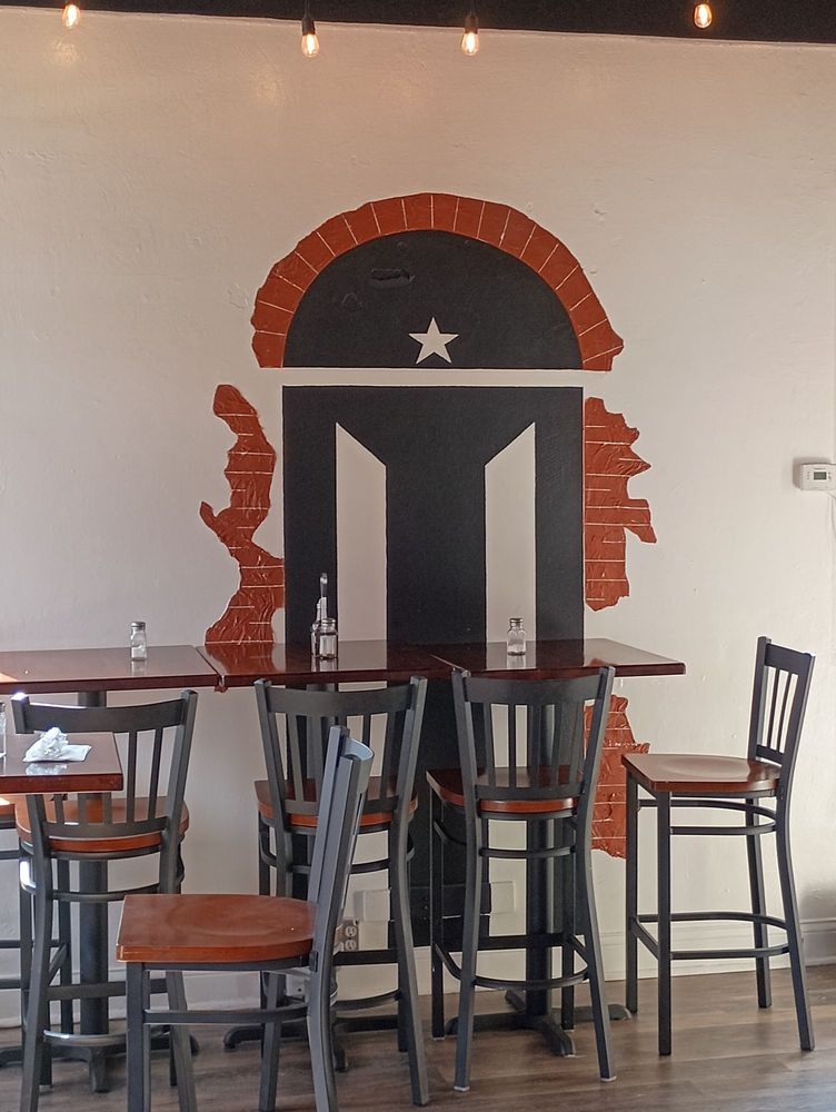 Puerto Rican flag mural inside Sazón Boricua in Cleveland